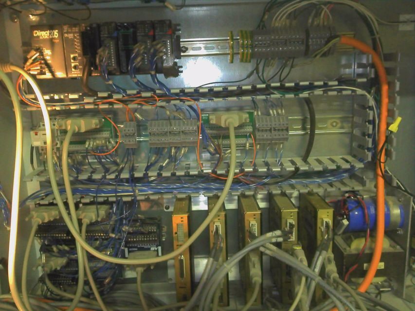 The original WinCNC control cabinet — DirectLOGIC 205 PLC and the Eclipse drives, before the teardown